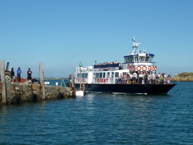 The Travel Trident coming in to Herm Harbour at fairly high tide. The steps are marked with white paint